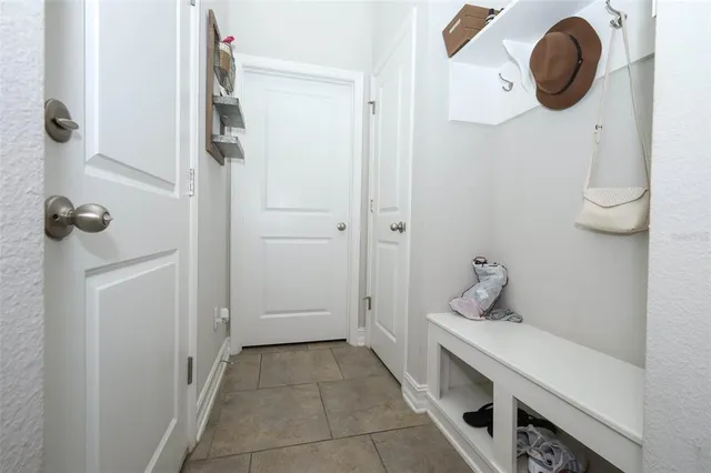 a bathroom with a sink a toilet and a shower