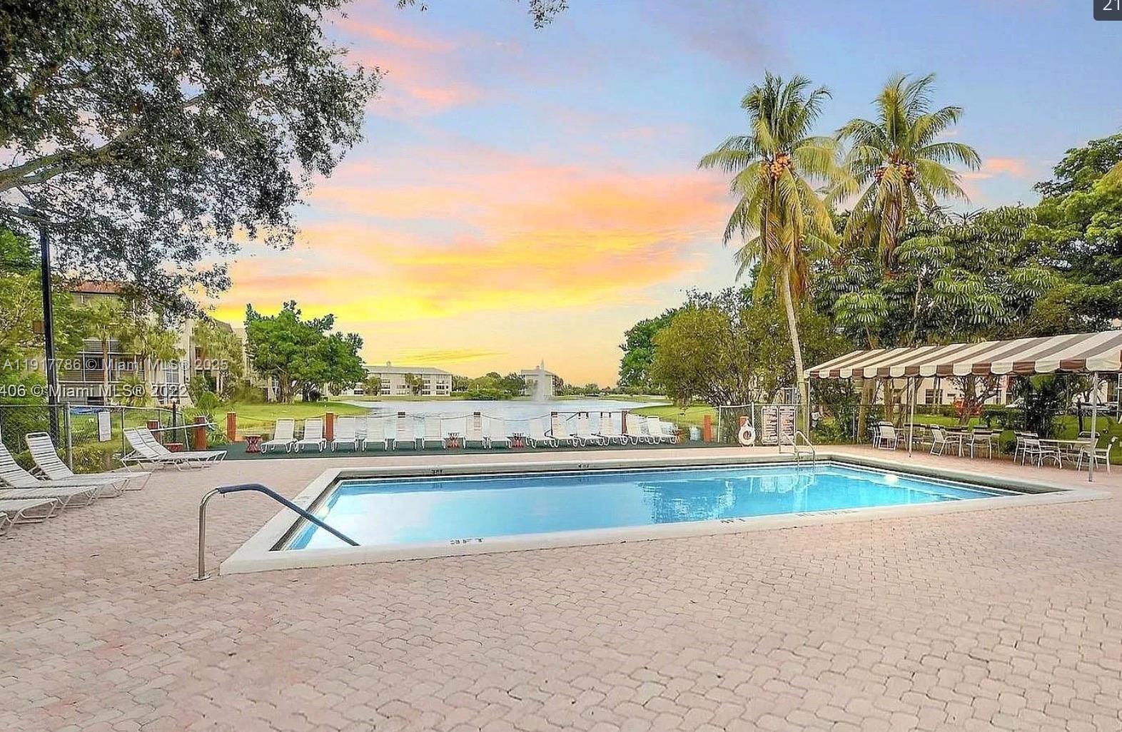 9230 Lagoon Place, Unit 215 Davie, FL 33324 - Photo 19 of 19 a view of swimming pool