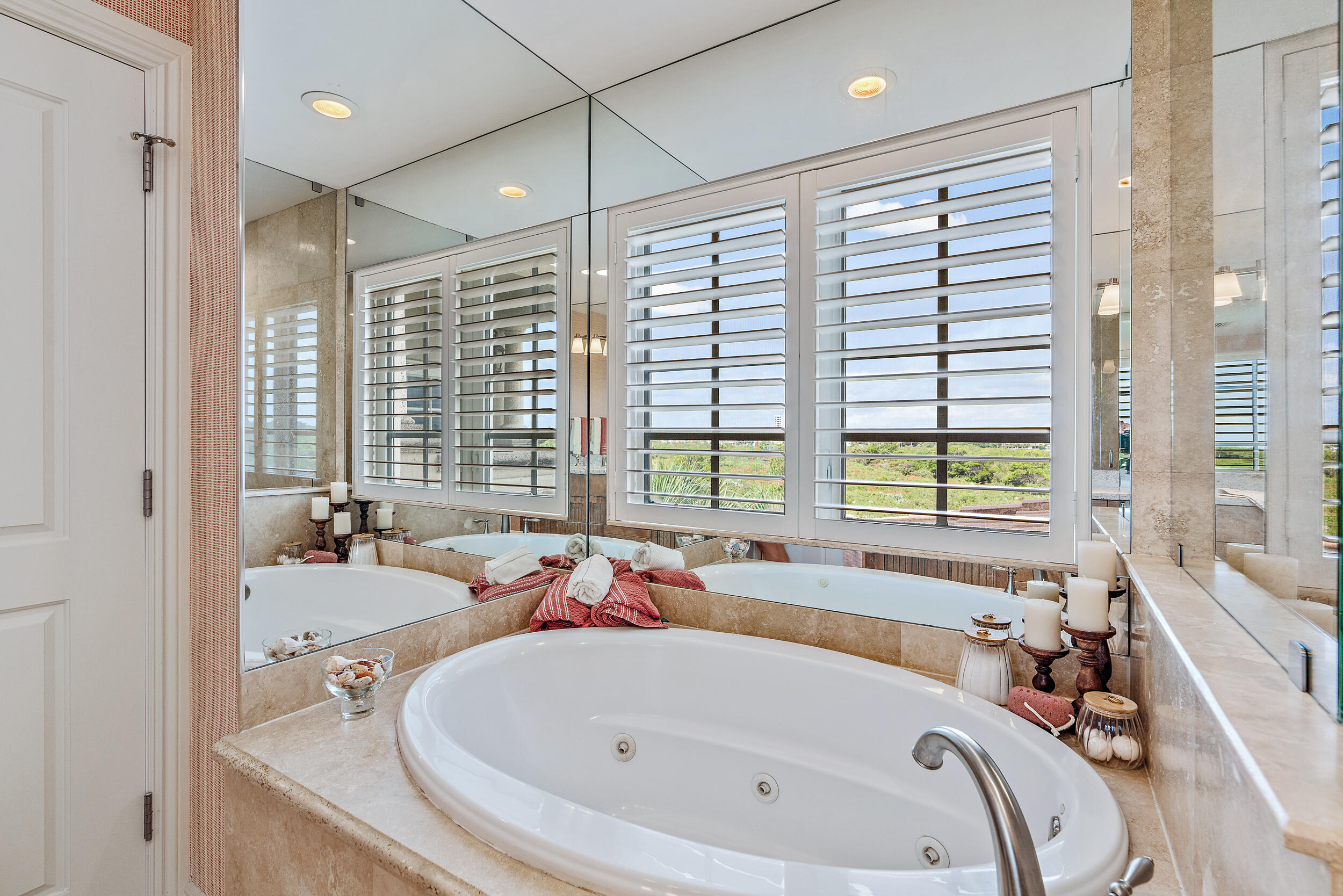 126 Tierra Lane, Unit 4 Jupiter, FL 33477 - Photo 14 of 45 a bathroom with a tub and a sink