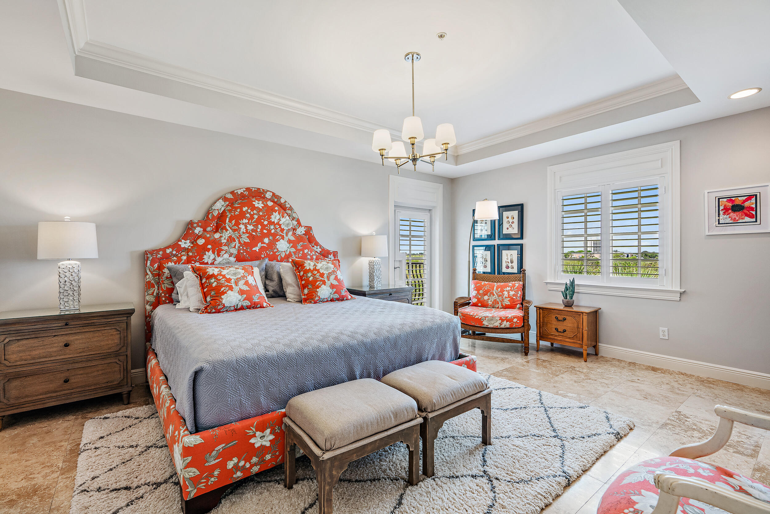 126 Tierra Lane, Unit 4 Jupiter, FL 33477 - Photo 15 of 45 a bedroom with a bed and wooden floor