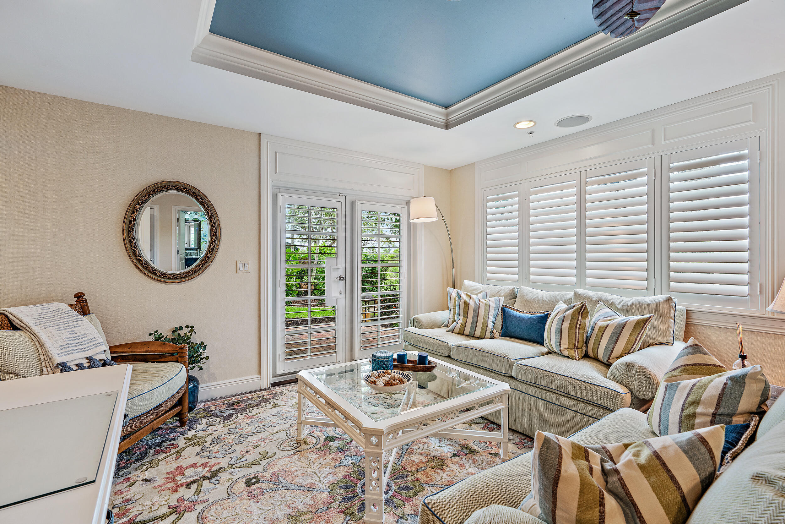 126 Tierra Lane, Unit 4 Jupiter, FL 33477 - Photo 26 of 45 a living room with furniture and a large window