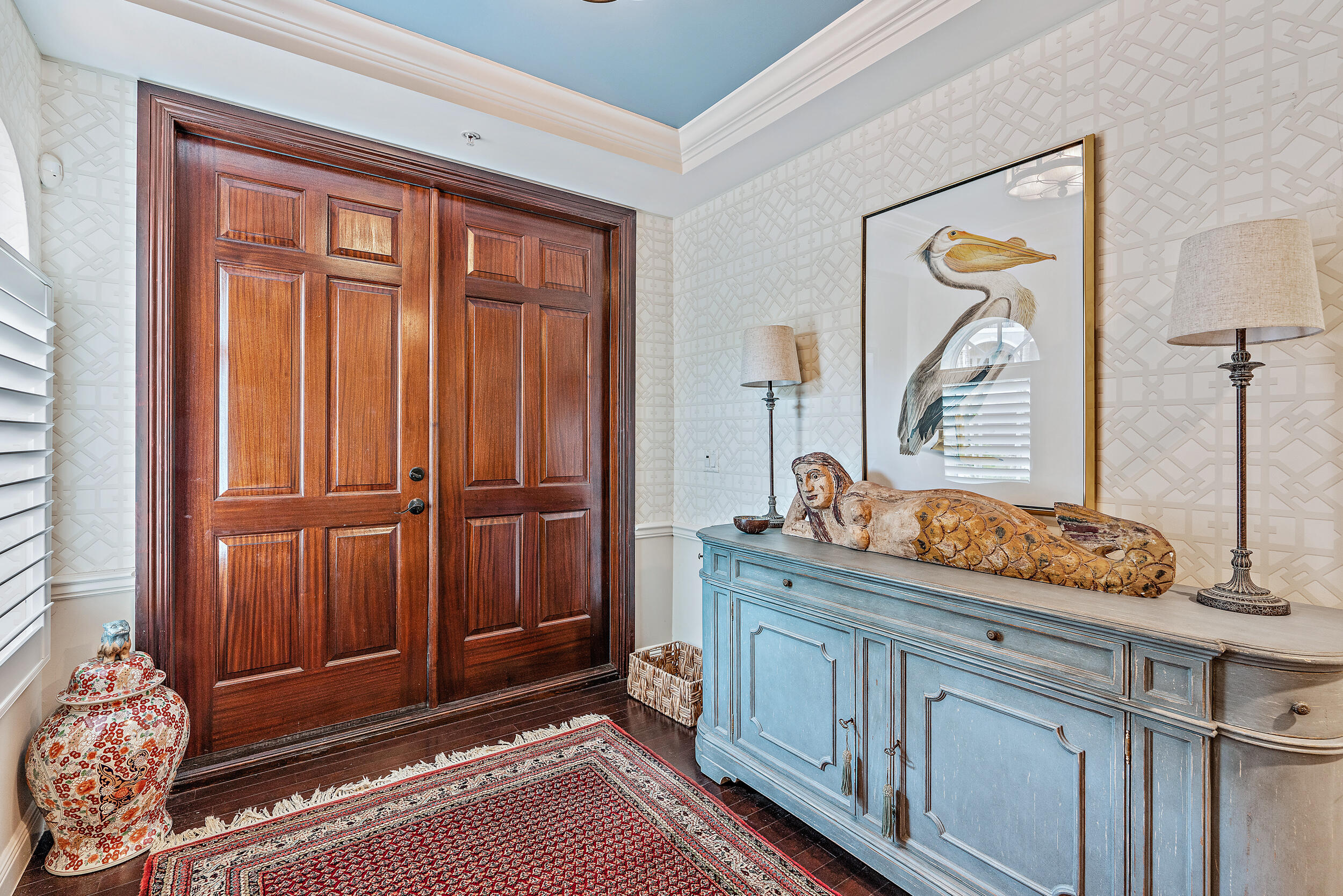 126 Tierra Lane, Unit 4 Jupiter, FL 33477 - Photo 3 of 45 a bathroom with a sink a mirror and next to a window