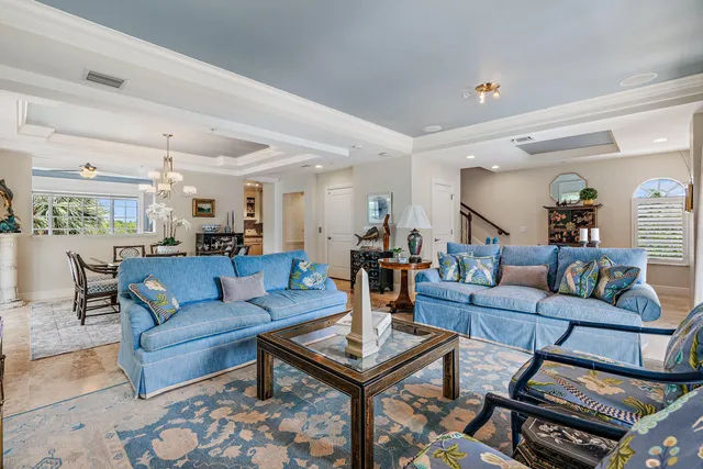 a living room with furniture and a table