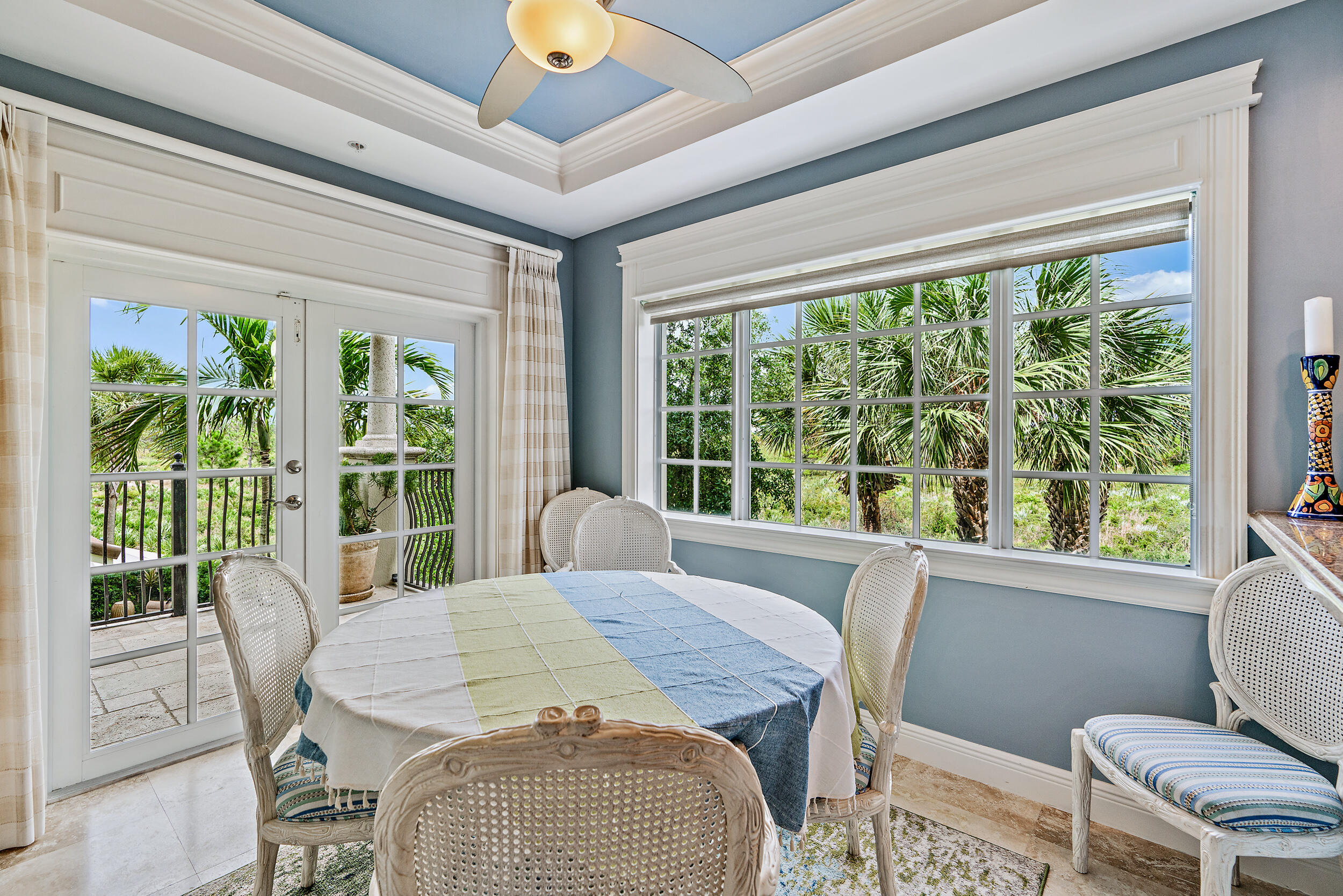 126 Tierra Lane, Unit 4 Jupiter, FL 33477 - Photo 9 of 45 a view of a dining room with furniture window and outside view
