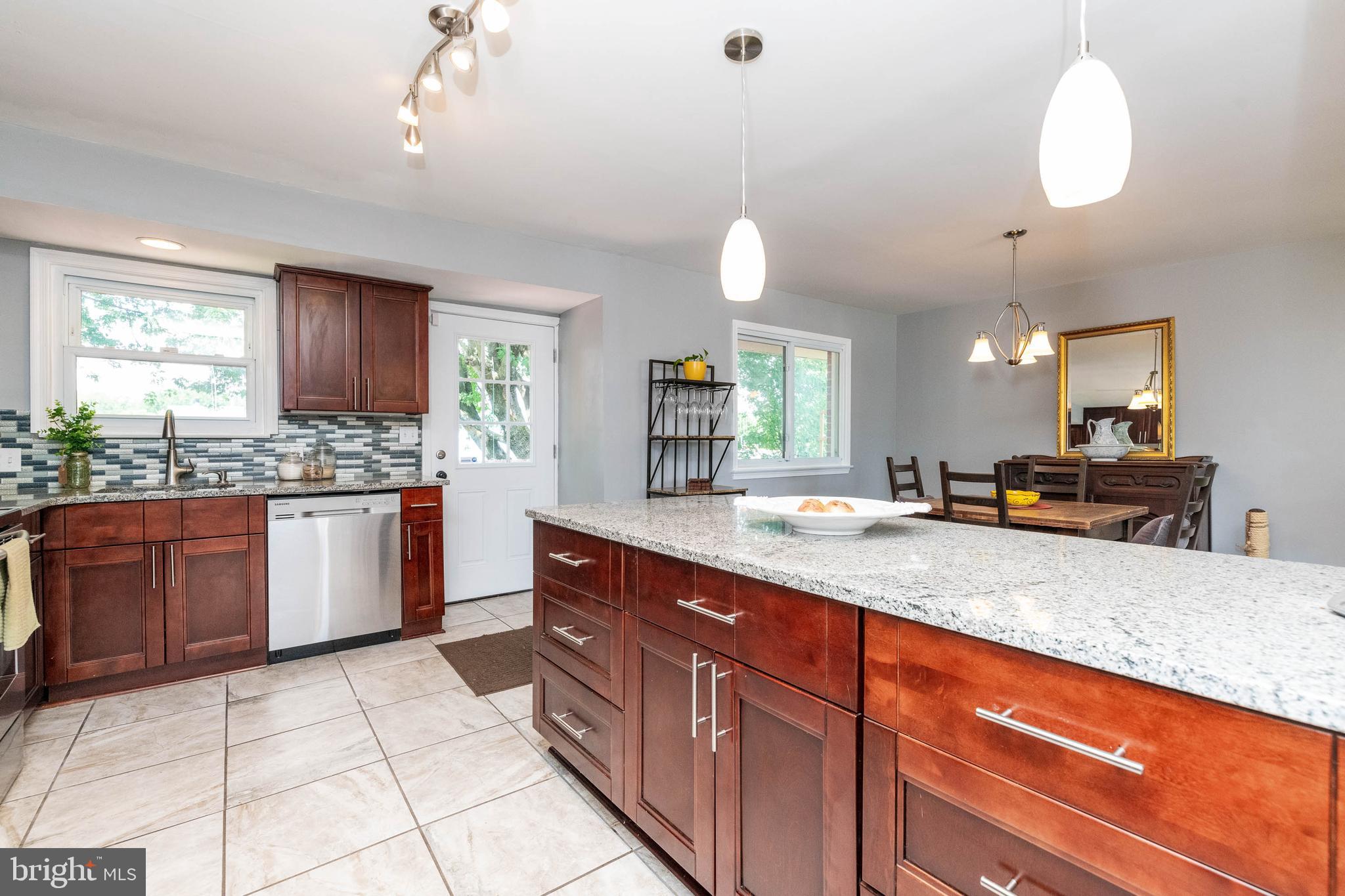3728 Live Oak Road Randallstown, MD 21133 - Photo 9 of 27 Renovated spacious kitchen w/ door to rear deck
