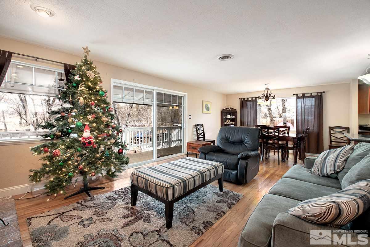 210 Rhodes Road Reno, NV 89521 - Photo 5 of 22 a living room with furniture and a christmas tree