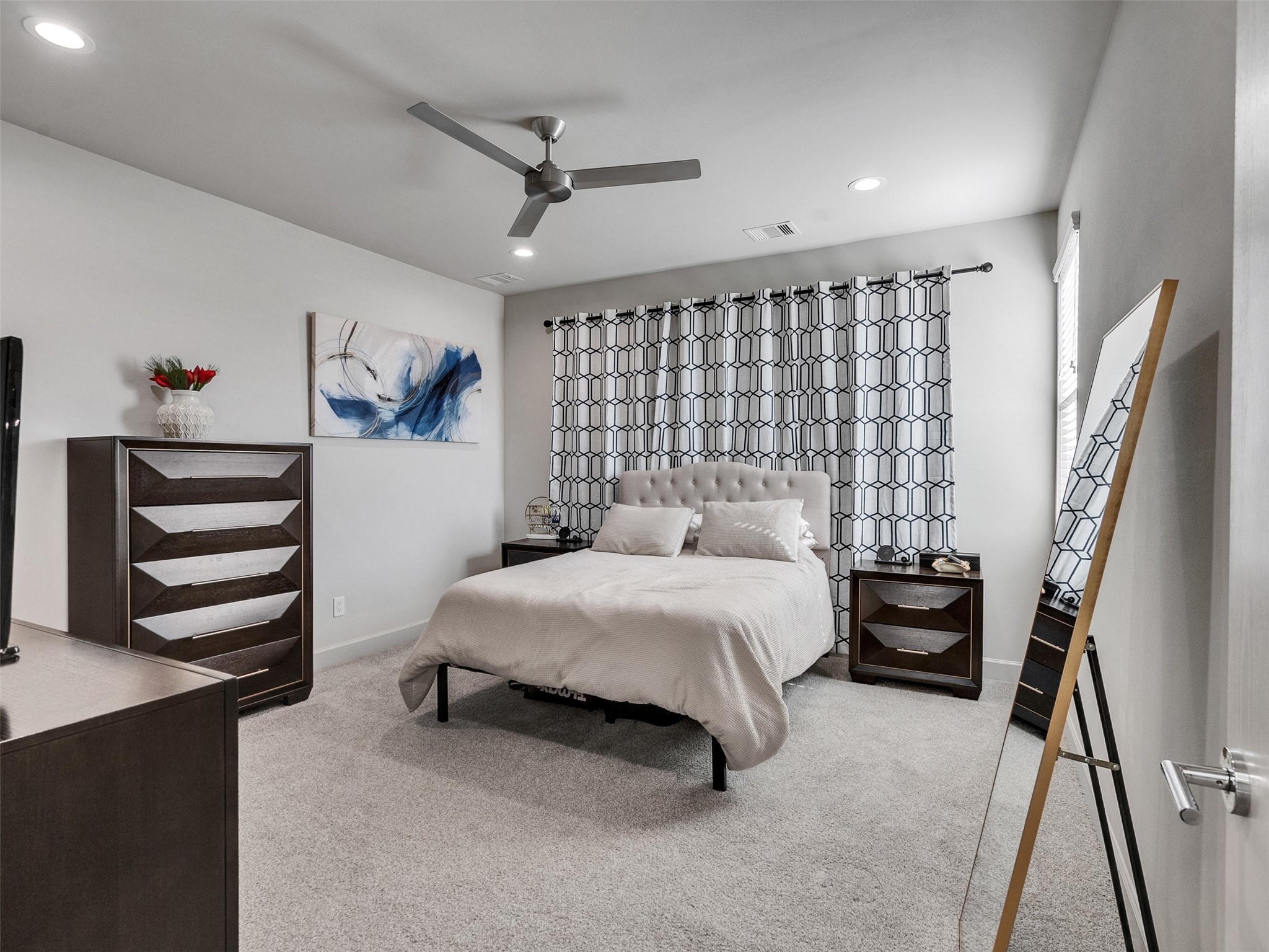 5702 Rucio Lane Houston, TX 77092 - Photo 13 of 30 a bedroom with a bed furniture and a window