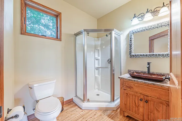 a view of a deck with chair and potted plants