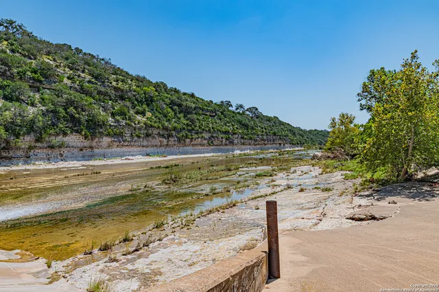 a view of a lake with a city