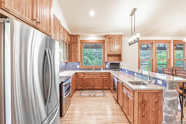 a bathroom with sink a bathtub and shower