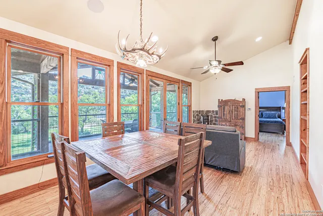 a view of a dining room with furniture window and wooden floor