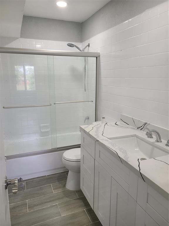 2775 Northwest 194th Terrace Miami Gardens, FL 33056 - Photo 12 of 37 a bathroom with a sink toilet and shower