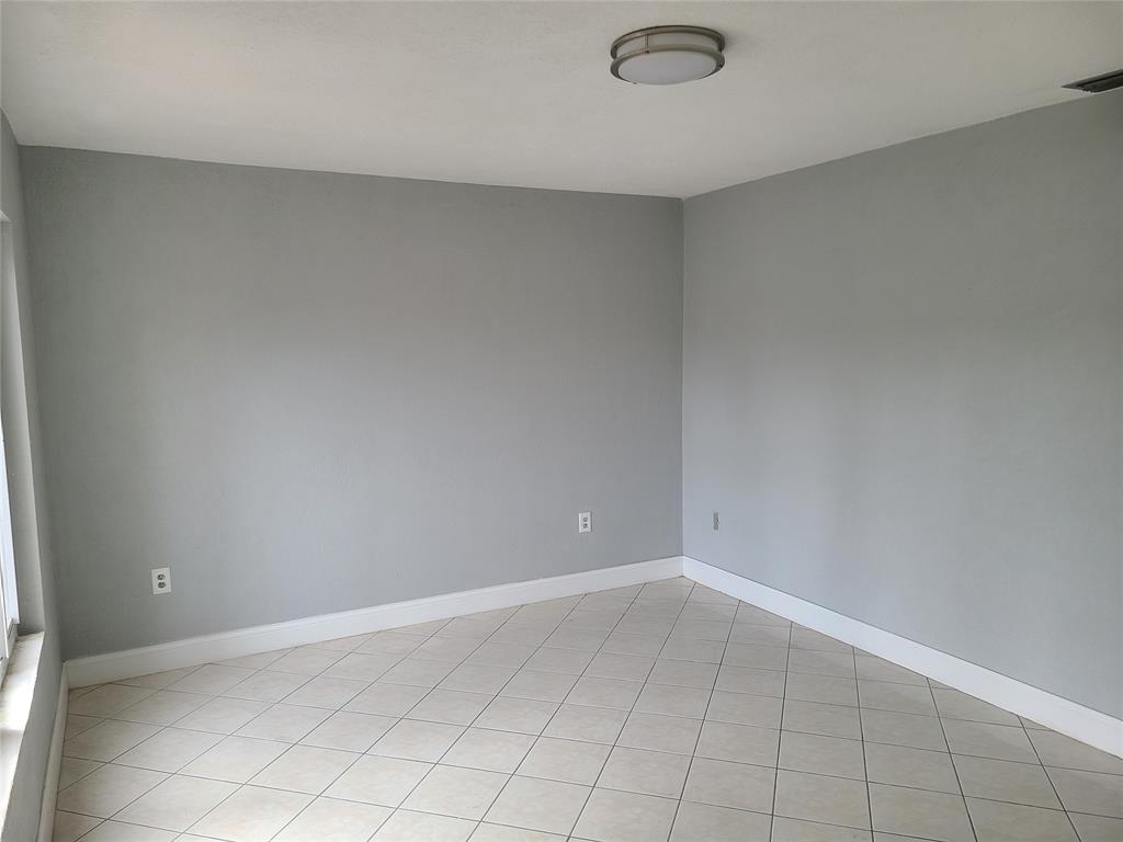 2775 Northwest 194th Terrace Miami Gardens, FL 33056 - Photo 16 of 37 a view of an empty room