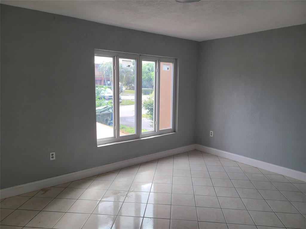 2775 Northwest 194th Terrace Miami Gardens, FL 33056 - Photo 19 of 37 a view of an empty room with a window