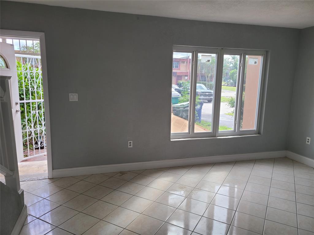 2775 Northwest 194th Terrace Miami Gardens, FL 33056 - Photo 20 of 37 a view of an empty room with a window