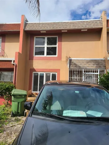 a view of a house with a balcony
