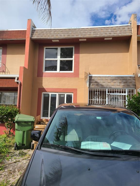 2775 Northwest 194th Terrace Miami Gardens, FL 33056 - Photo 2 of 37 a view of a house with a balcony