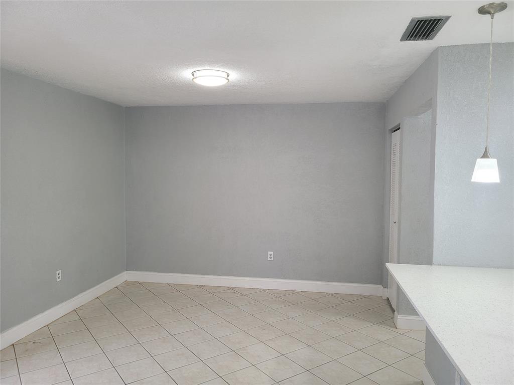 2775 Northwest 194th Terrace Miami Gardens, FL 33056 - Photo 29 of 37 a view of an empty room