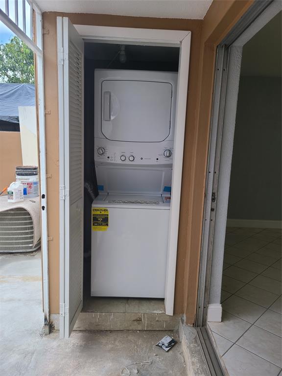 2775 Northwest 194th Terrace Miami Gardens, FL 33056 - Photo 31 of 37 a utility room with a washer and dryer