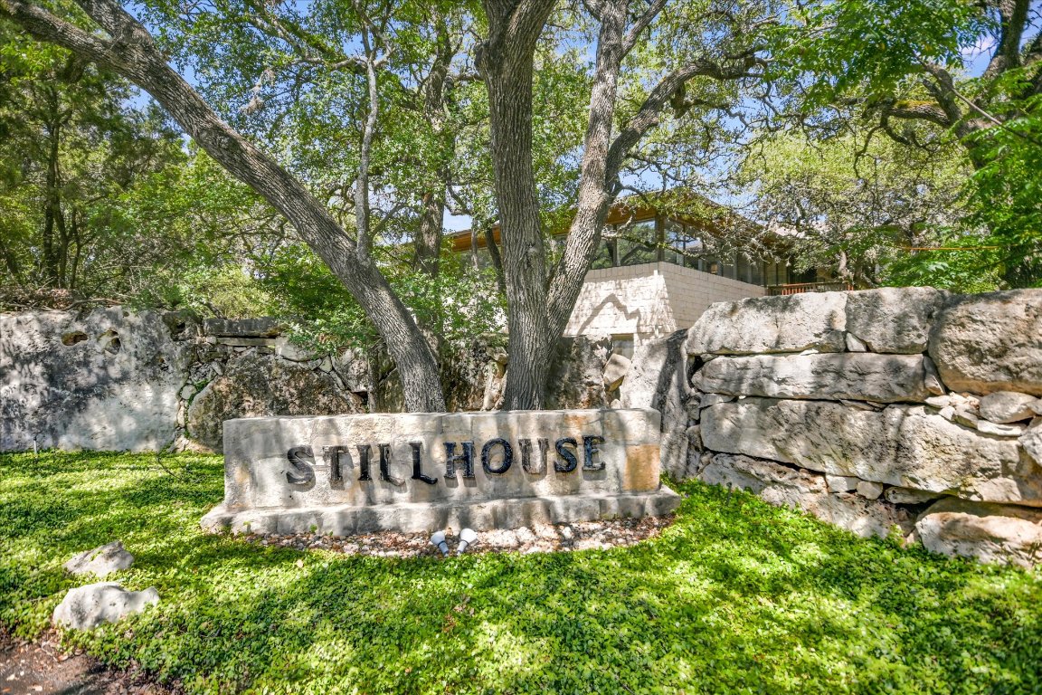 4711 Spicewood Springs Road, Unit 163 Austin, TX 78759 - Photo 12 of 17 a view of a chair and table and chairs in the garden