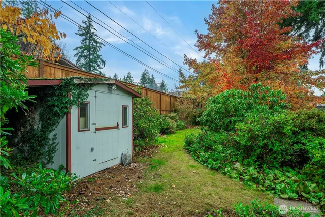a view of a house with a small yard