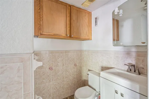 a bathroom with a bathtub and a sink