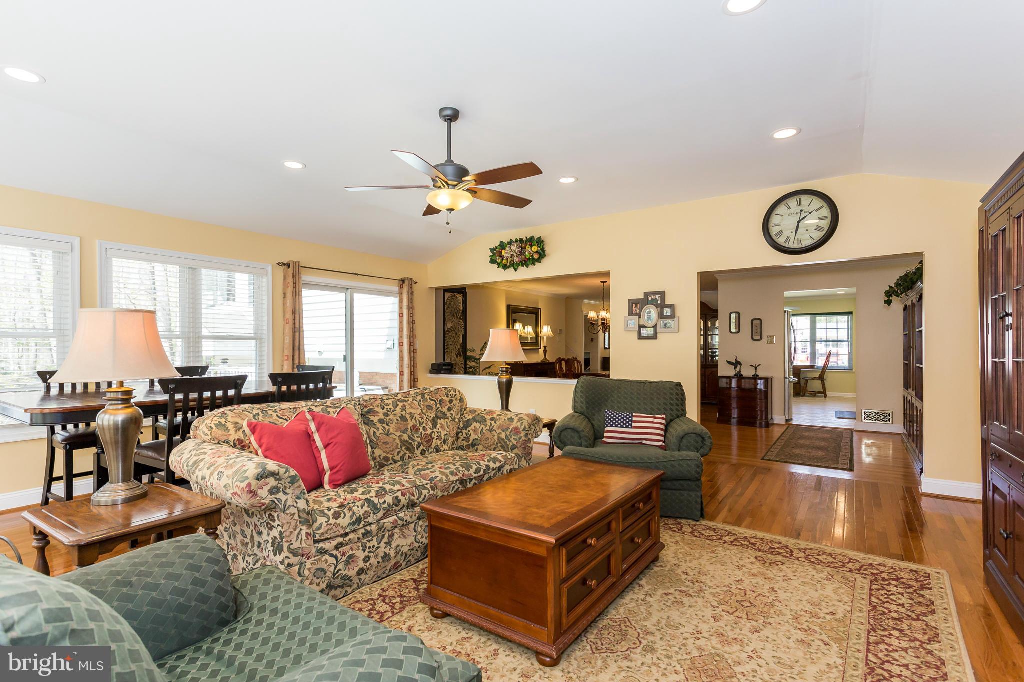 7709 Heming Place Springfield, VA 22151 - Photo 15 of 30 Gas fireplace, access to deck from family room