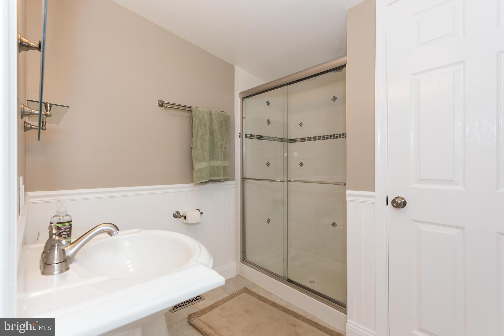 7709 Heming Place Springfield, VA 22151 - Photo 17 of 30 Full bath on main level, just off family room