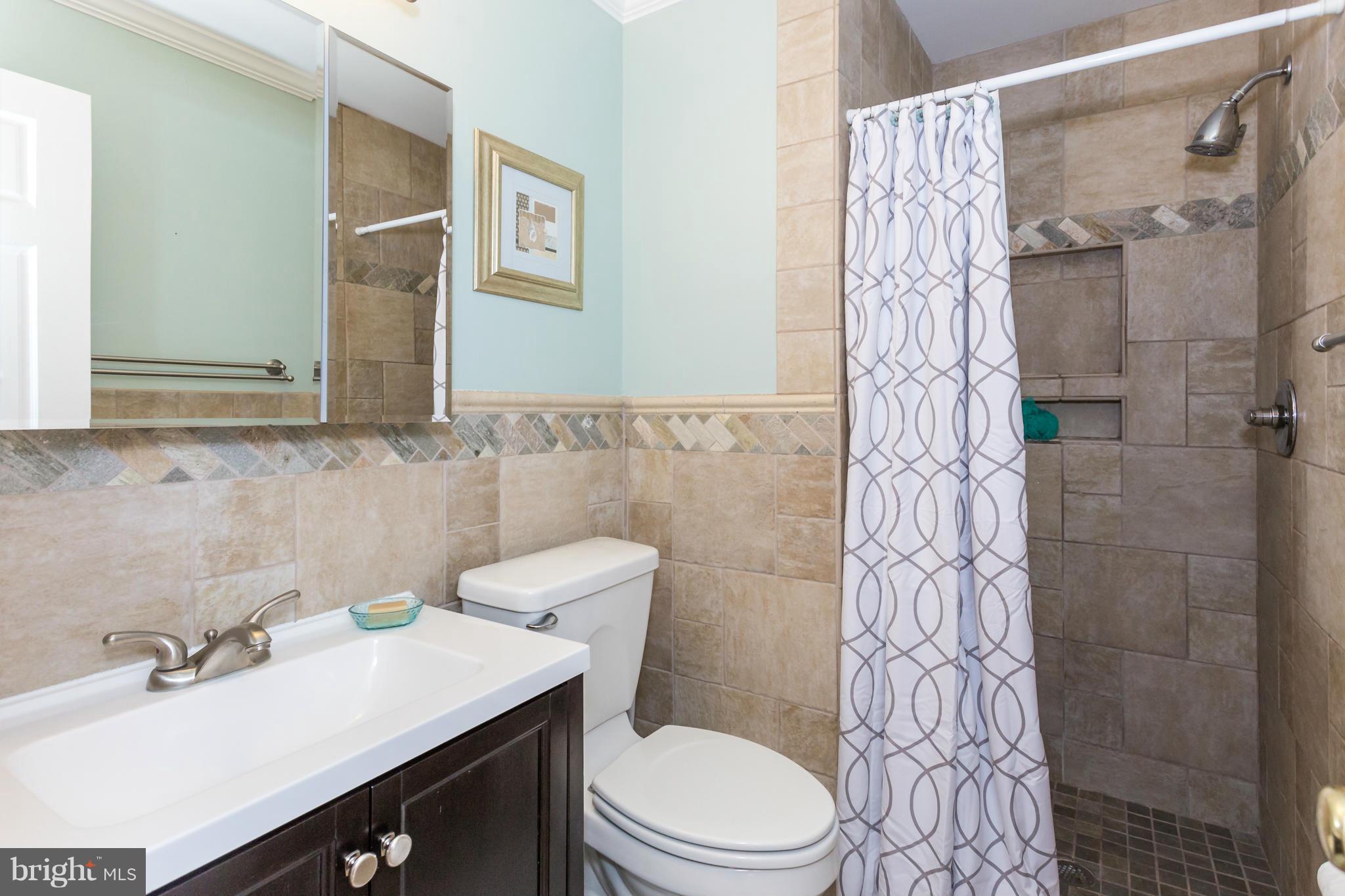 7709 Heming Place Springfield, VA 22151 - Photo 19 of 30 New Vanity, shower enclosure with custom nooks