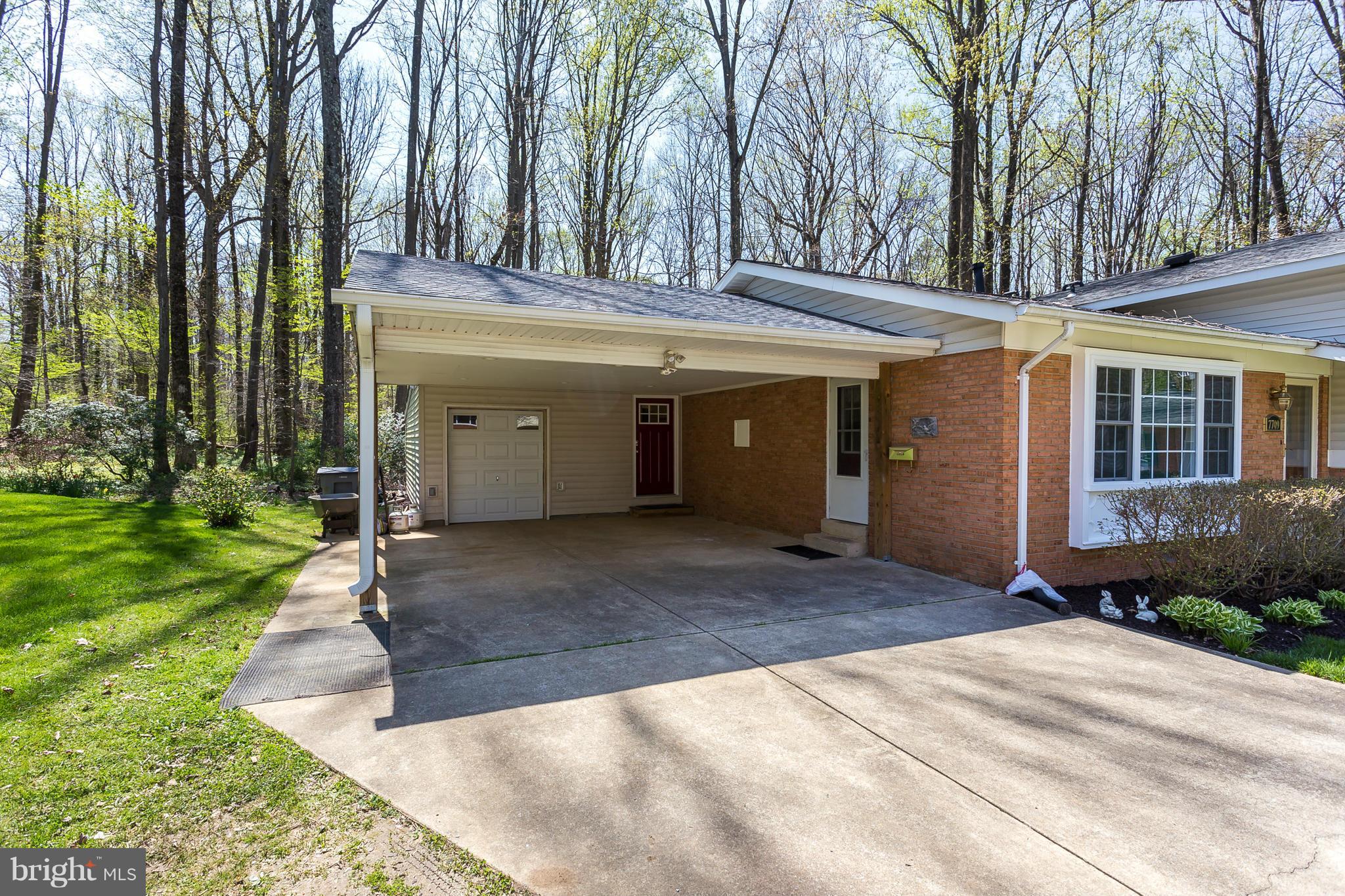 7709 Heming Place Springfield, VA 22151 - Photo 3 of 30 1 car garage + 2 vehicle carport + long driveway!