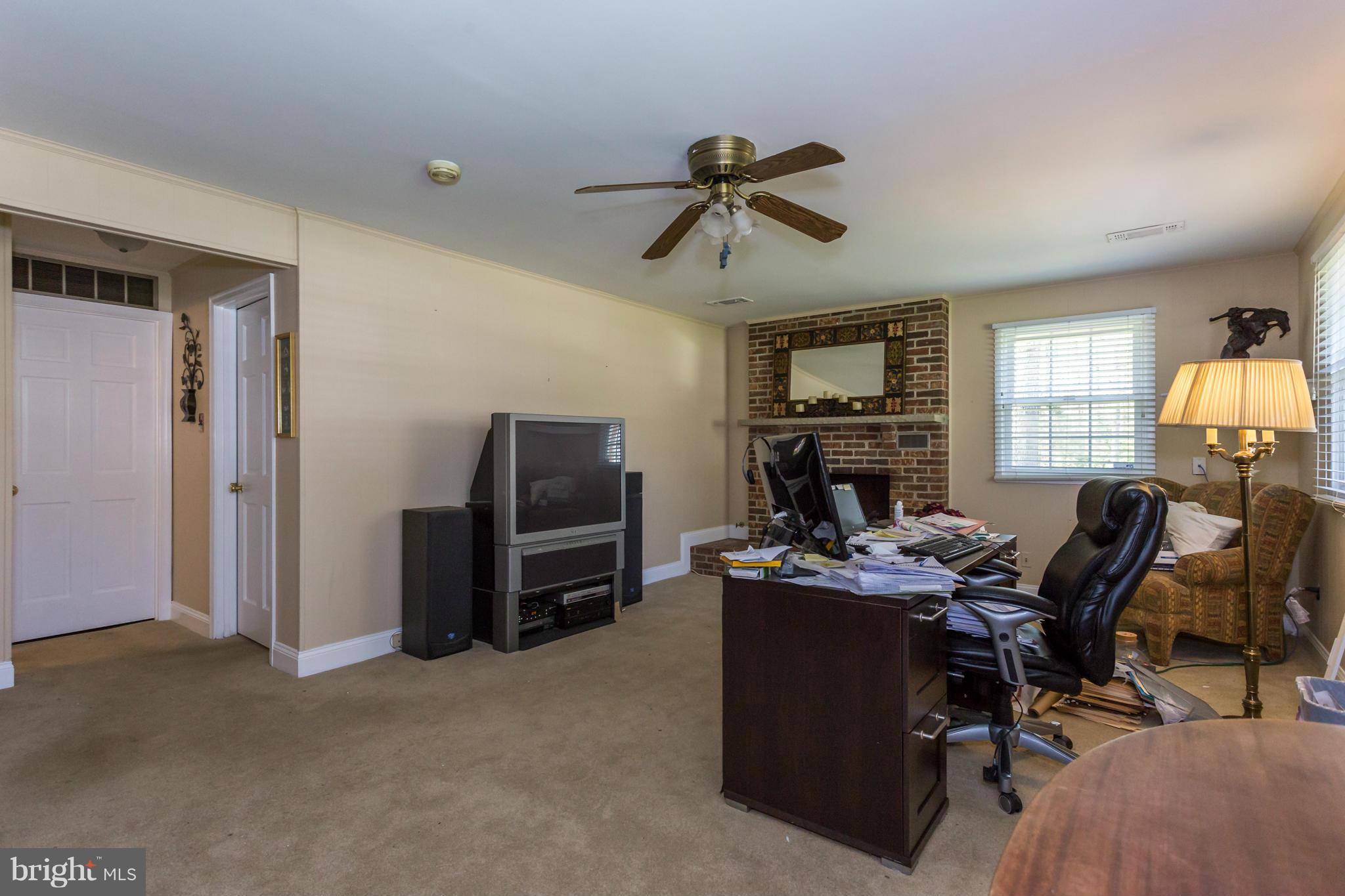 7709 Heming Place Springfield, VA 22151 - Photo 25 of 30 Fireplace. Ample room for a study w natural light