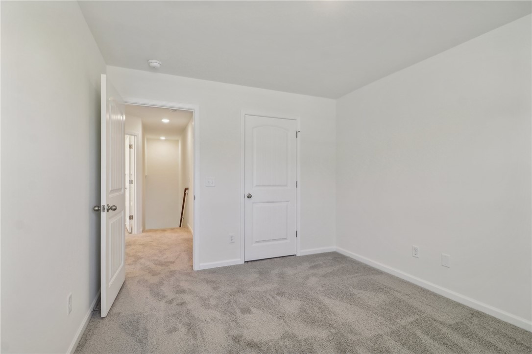 206 Bellflower Lane Pendleton, SC 29670 - Photo 12 of 27 This spacious room offers comfort and versatility with plush carpeting and ample natural light.