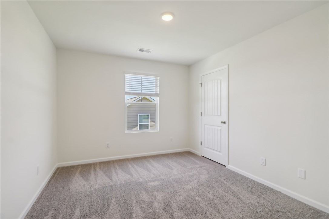 206 Bellflower Lane Pendleton, SC 29670 - Photo 14 of 27 This bright, inviting room offers a comfortable, versatile space for living.