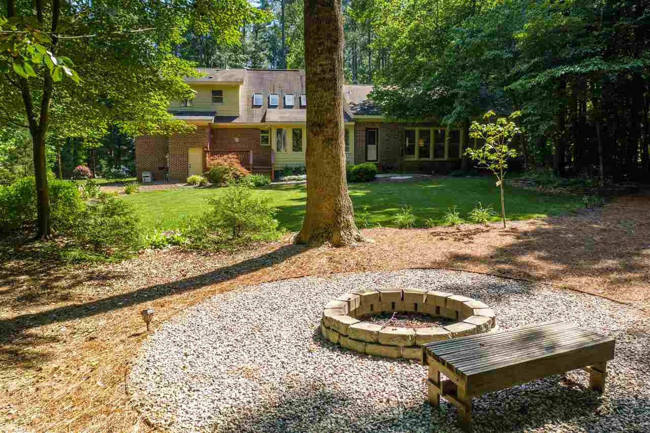 3132 Mt Vernon Church Road Raleigh, NC 27613 - Photo 27 of 30 Great yard with Fire pit and maybe part of the yard could be turn into a garden area.