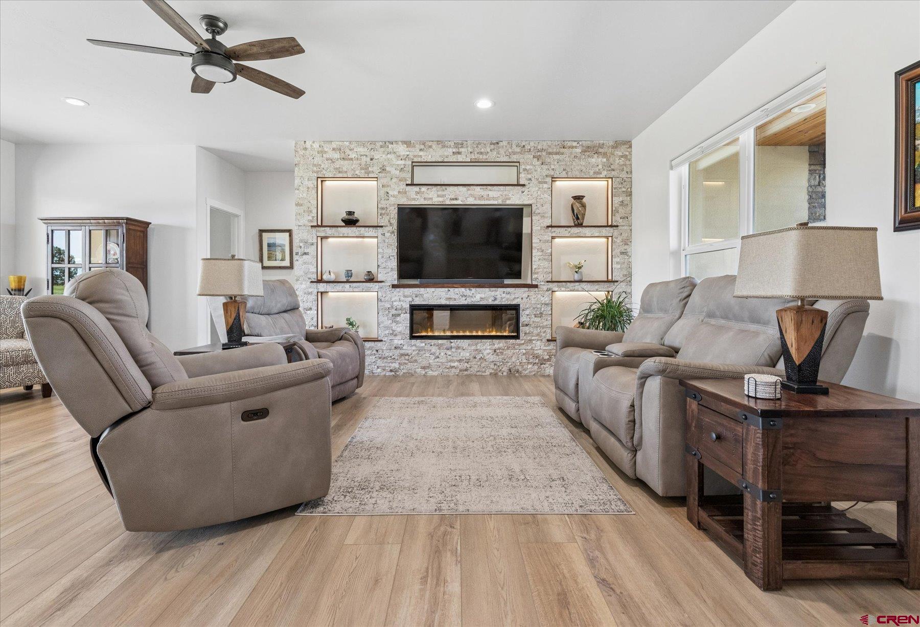 1937 Golf Course Lane Cortez, CO 81321 - Photo 5 of 31 a living room with furniture and a flat screen tv