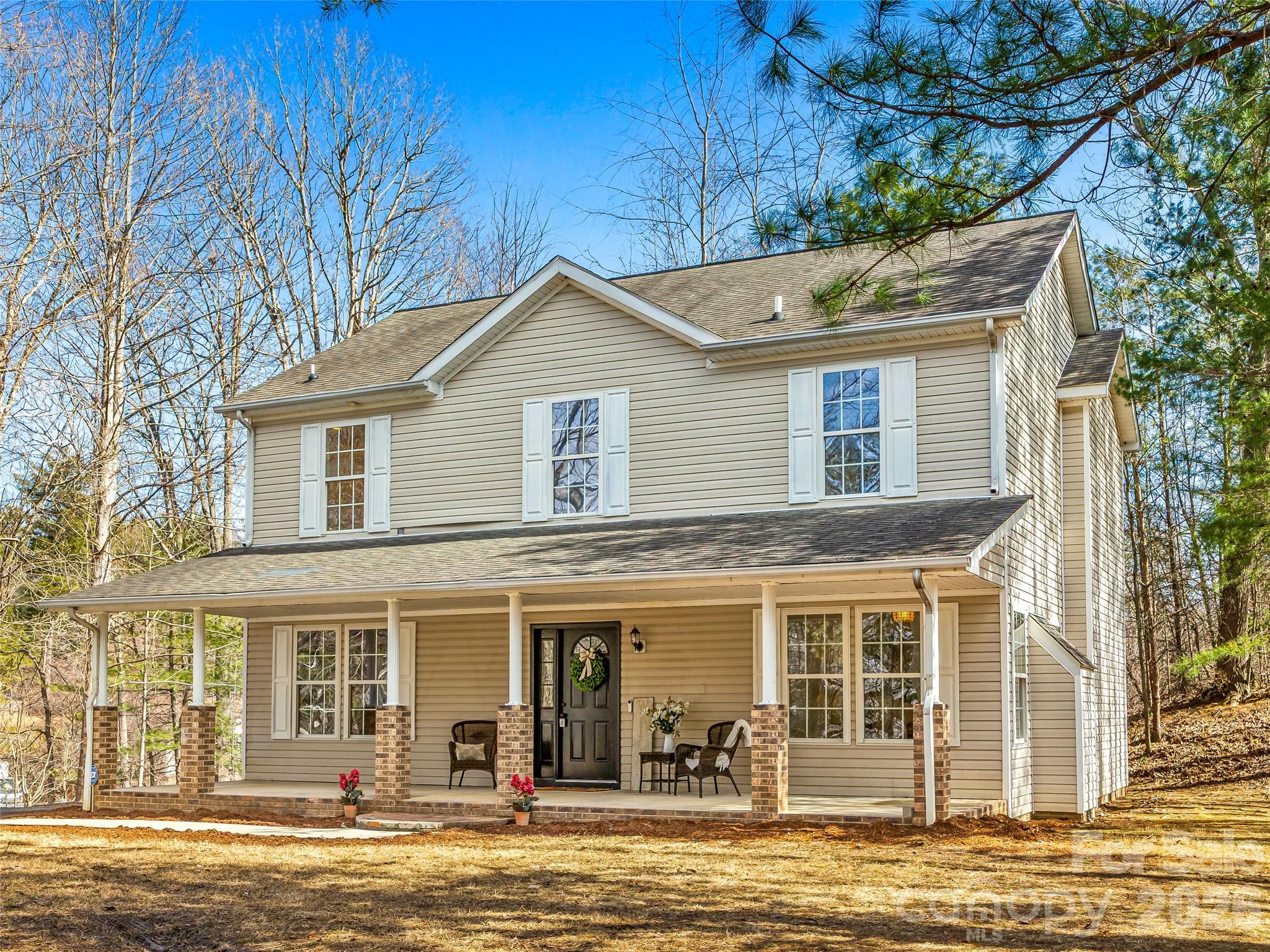 907 Gleason Street Arden, NC 28704 - Photo 1 of 41 a view of a house with a swimming pool