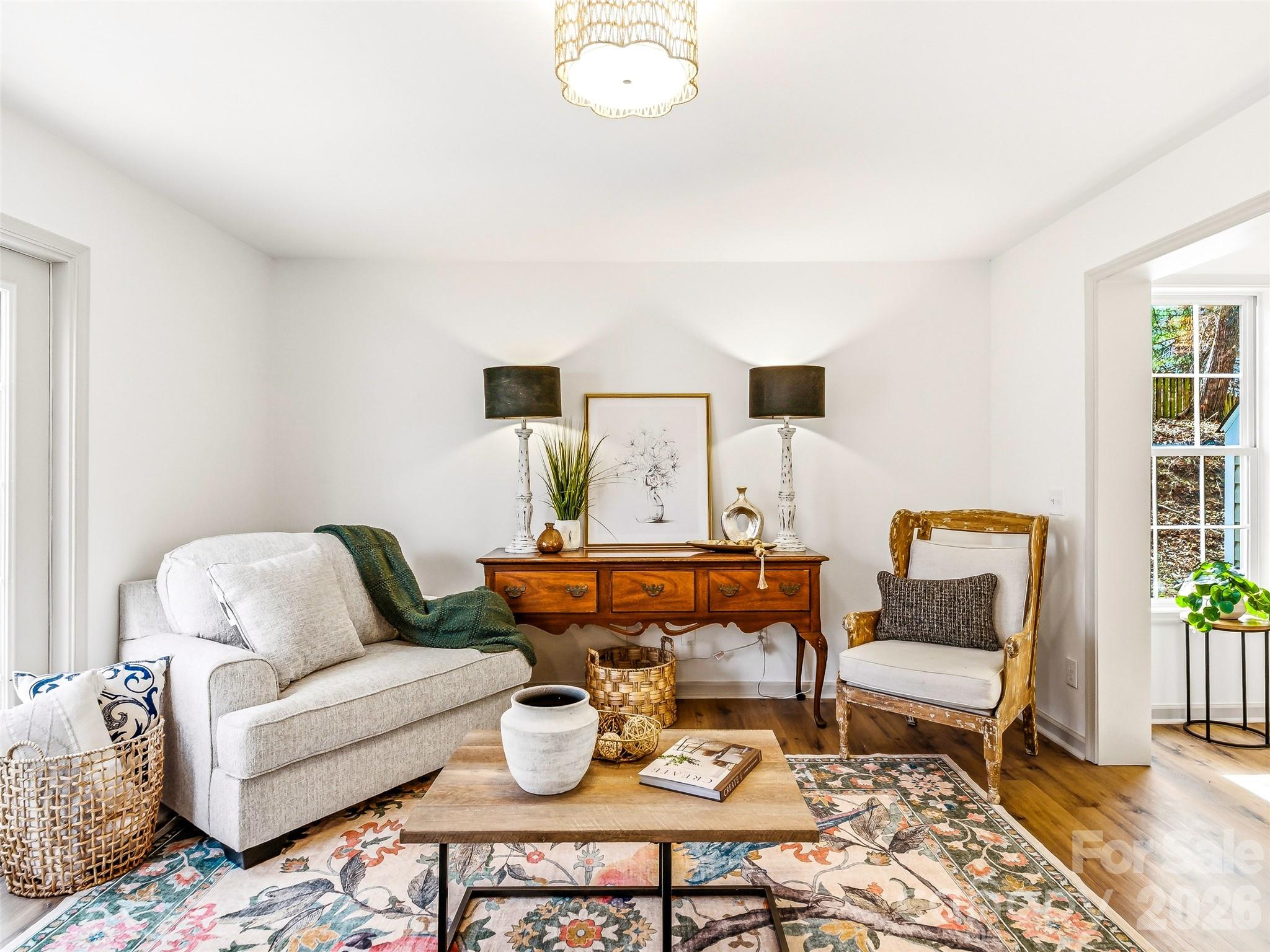 907 Gleason Street Arden, NC 28704 - Photo 11 of 41 a living room with furniture and wooden floor