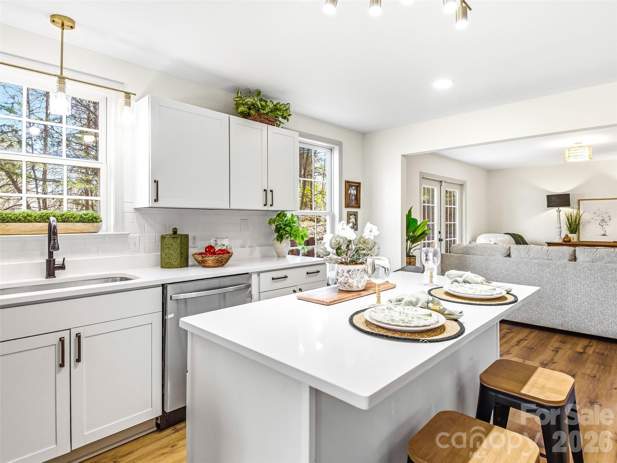 907 Gleason Street Arden, NC 28704 - Photo 16 of 41 a kitchen with a sink and stove