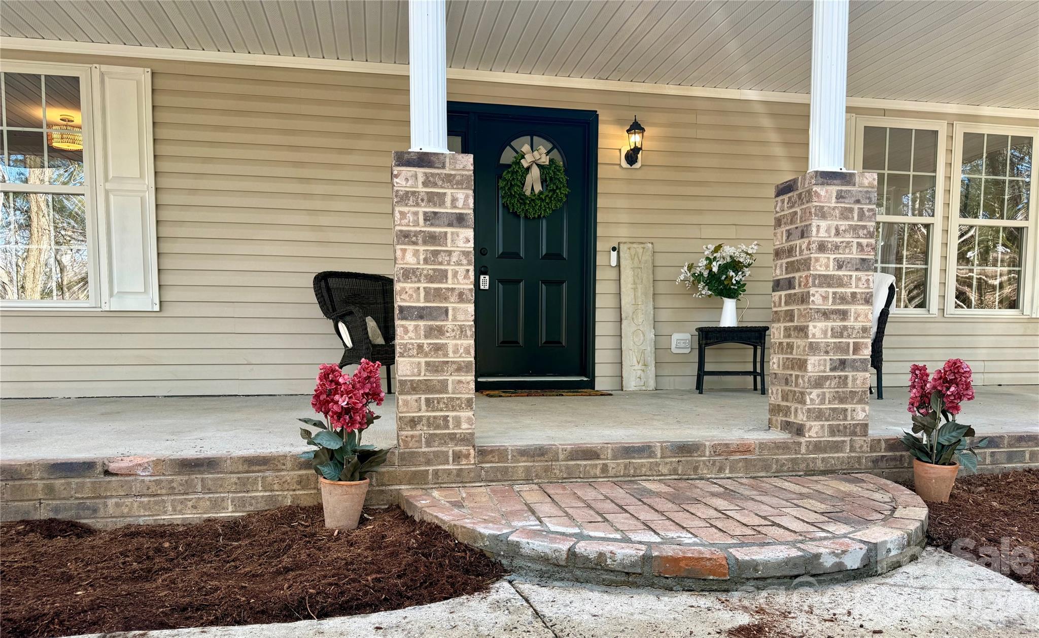 907 Gleason Street Arden, NC 28704 - Photo 2 of 41 a front view of a house with a yard