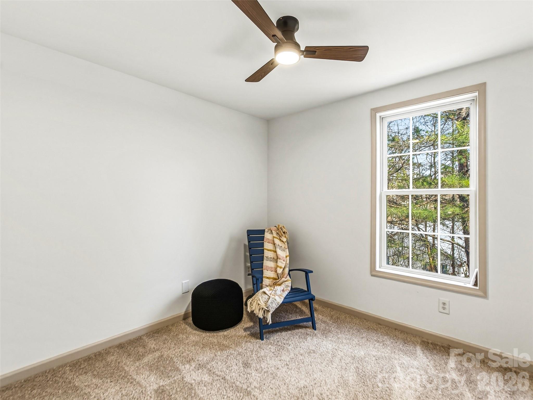 907 Gleason Street Arden, NC 28704 - Photo 29 of 41 a room with a window and gym equipment
