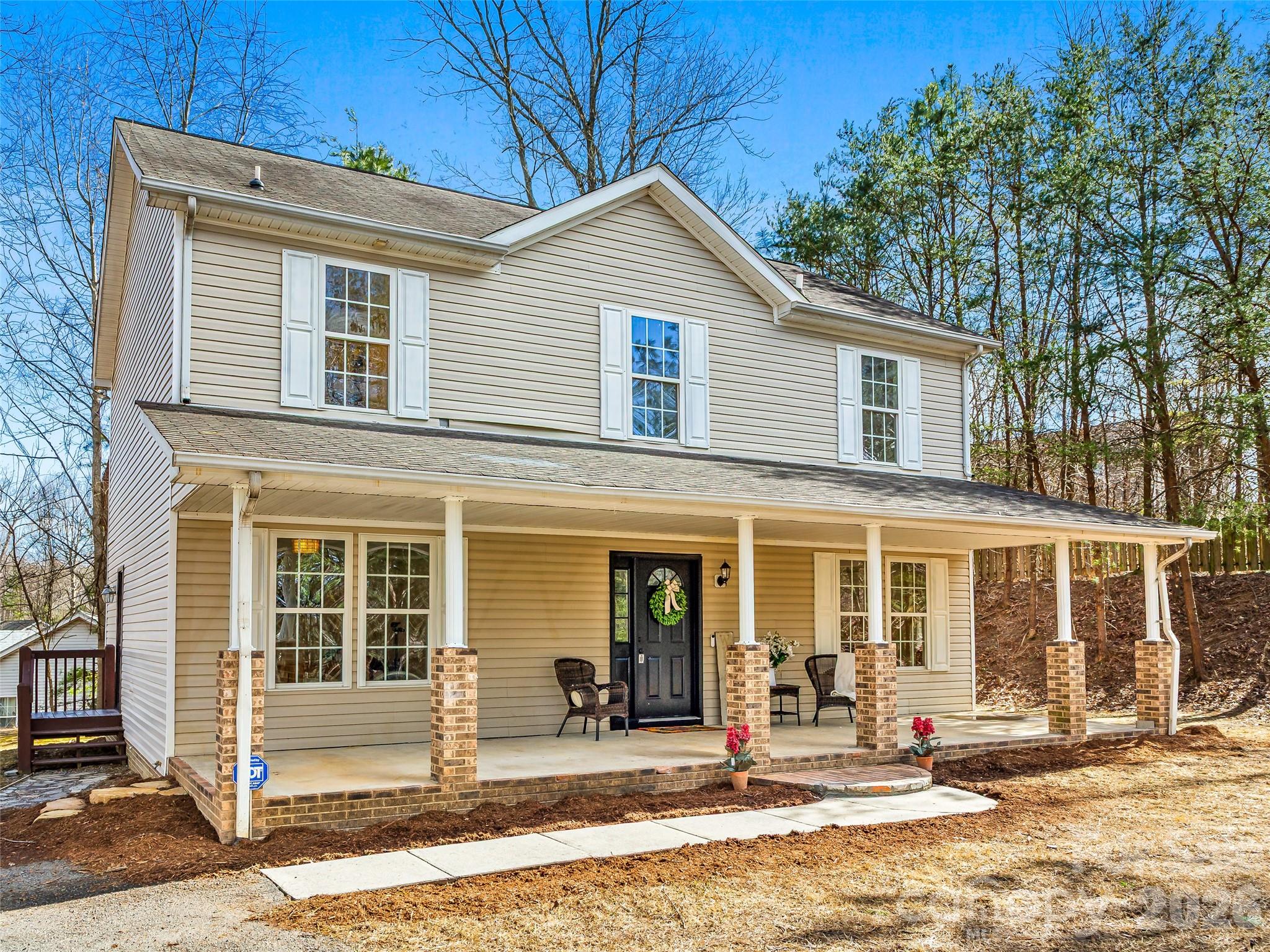 907 Gleason Street Arden, NC 28704 - Photo 40 of 41 a front view of a house with a patio