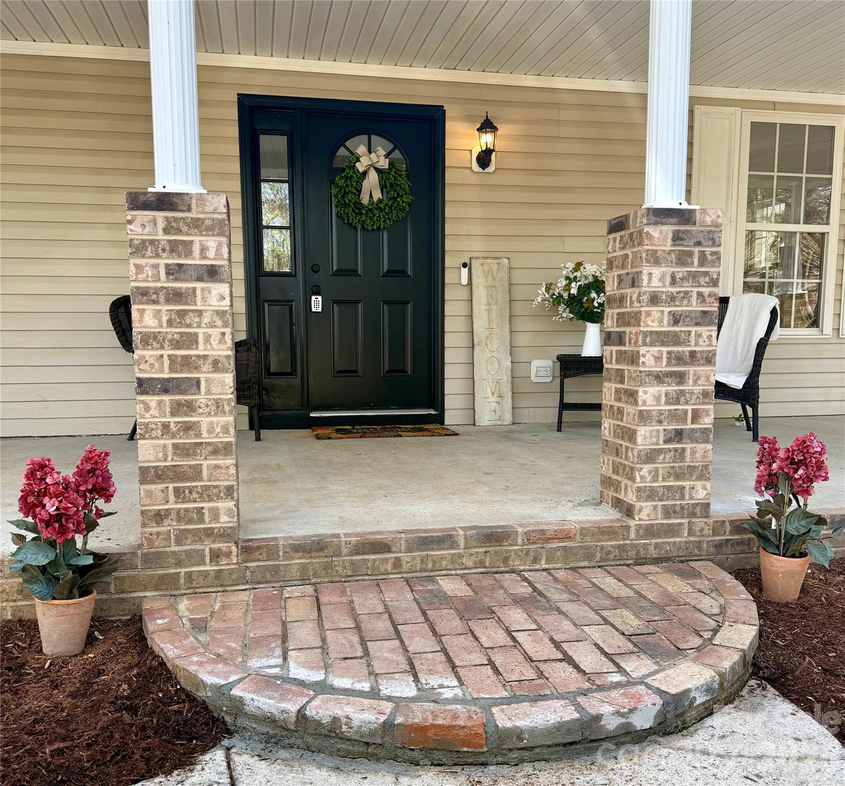 907 Gleason Street Arden, NC 28704 - Photo 41 of 41 a view of a entryway door of the house