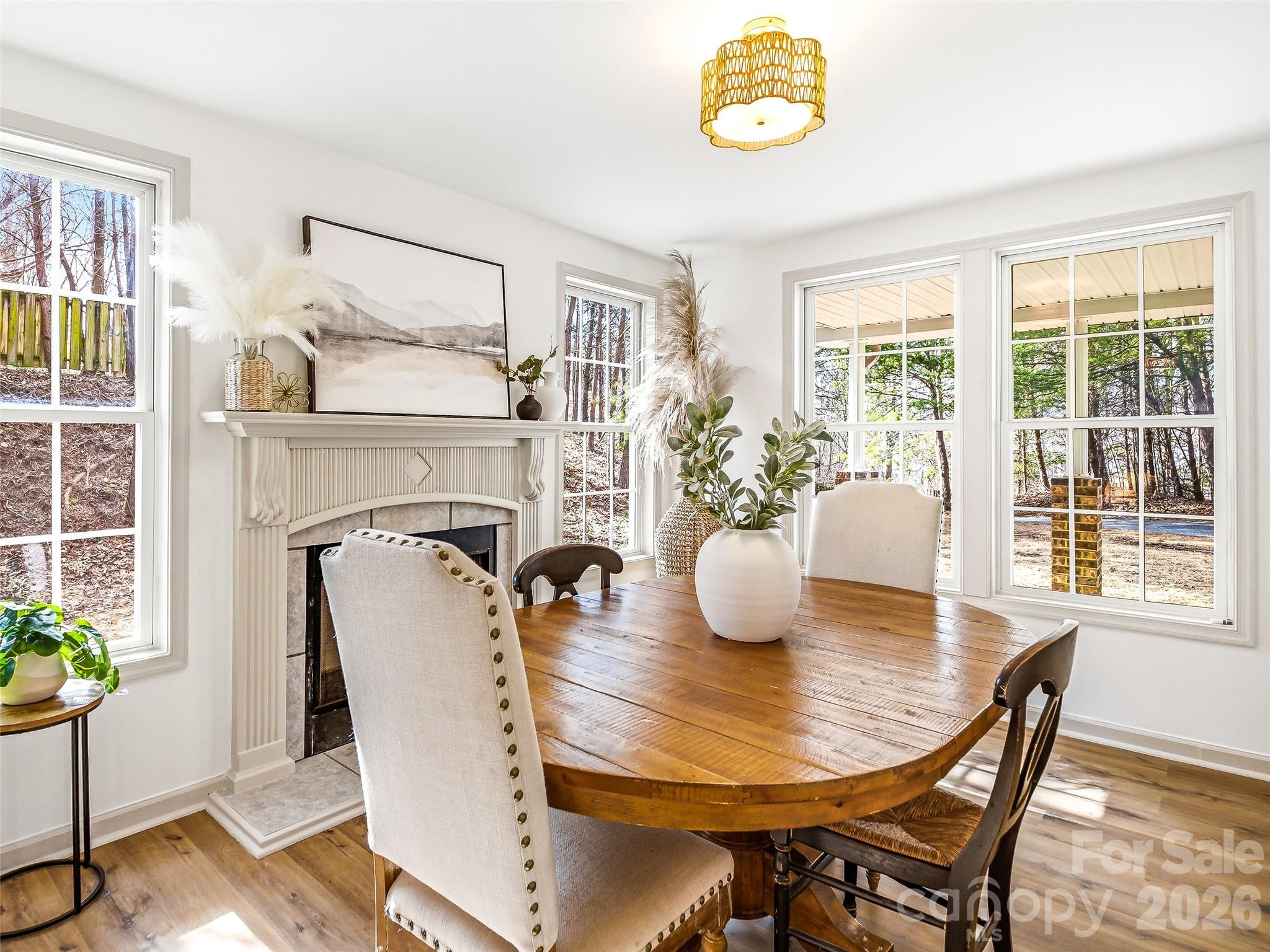 907 Gleason Street Arden, NC 28704 - Photo 7 of 41 a view of a dining room with furniture and wooden floor
