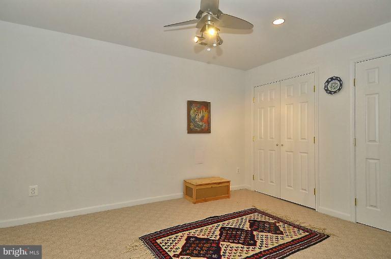505 Great Falls Road Rockville, MD 20850 - Photo 12 of 30 a view of workspace with furniture and chandelier