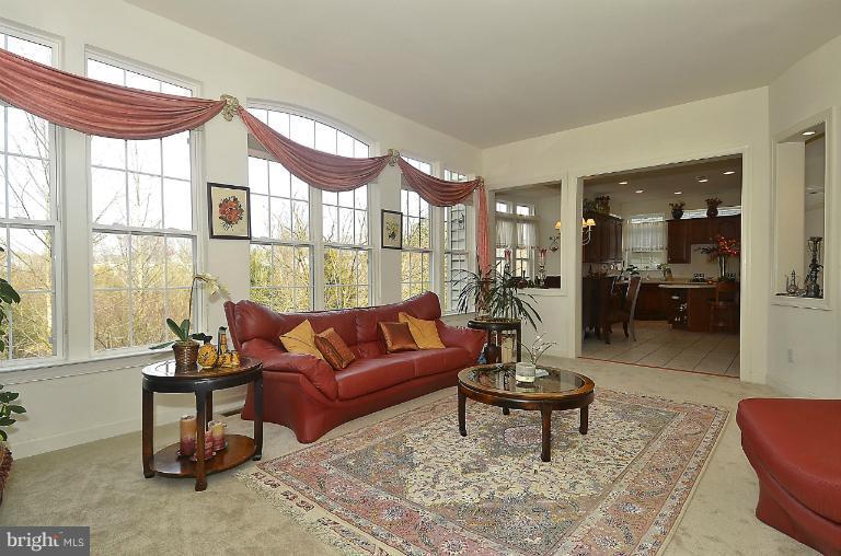 505 Great Falls Road Rockville, MD 20850 - Photo 20 of 30 a living room with furniture and a large window