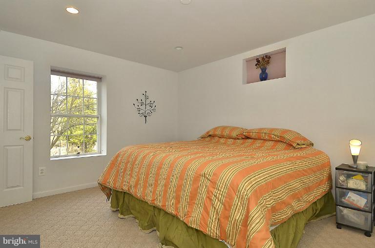 505 Great Falls Road Rockville, MD 20850 - Photo 24 of 30 a bedroom with a bed and window