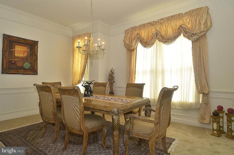 505 Great Falls Road Rockville, MD 20850 - Photo 10 of 30 a view of a dining room with furniture window and outside view