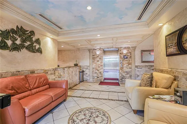 a living room with furniture and a couch