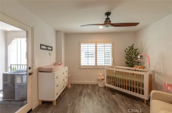 a bedroom with furniture and windows
