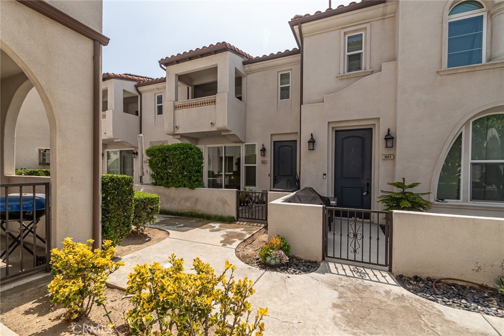 7019 Passons Boulevard Pico Rivera, CA 90660 - Photo 3 of 27 a view of a house with a yard and sitting area